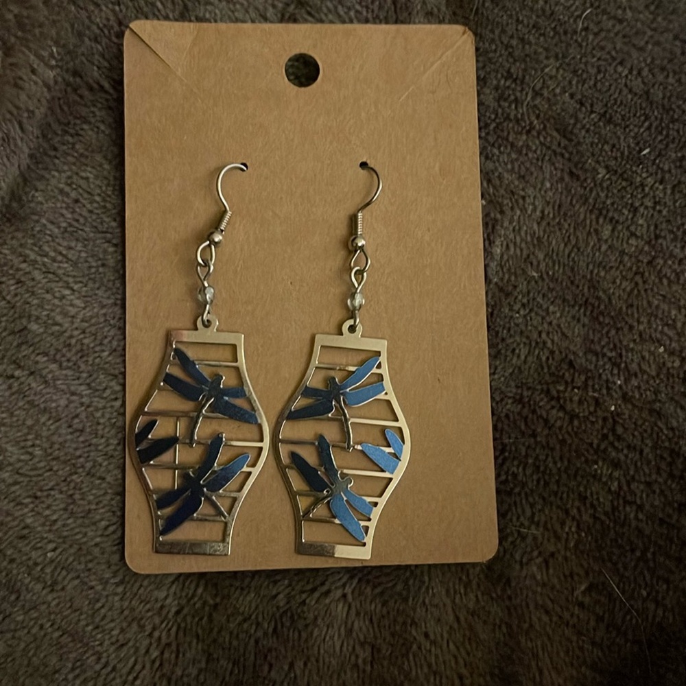 Silver dangle earrings with dragonflies.